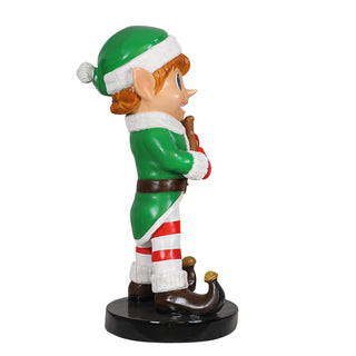 Elf Boy Holding Gingerbread